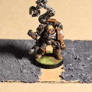 Citadel Astrogranite texture paints (paste). The thin one to the left and the "Debris" to the right