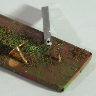 Mounting barbed wire